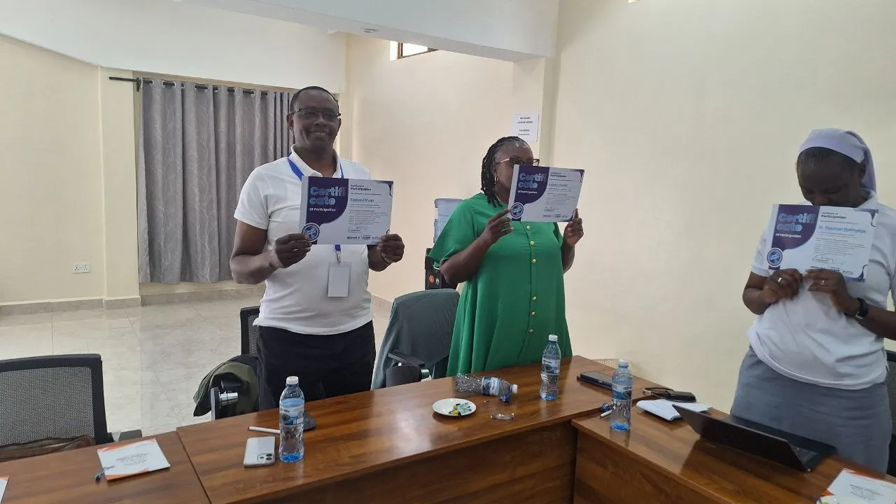 Fundraising and programme staff receiving Resmob Solutions certificates for AI-assisted donor research and proposal development